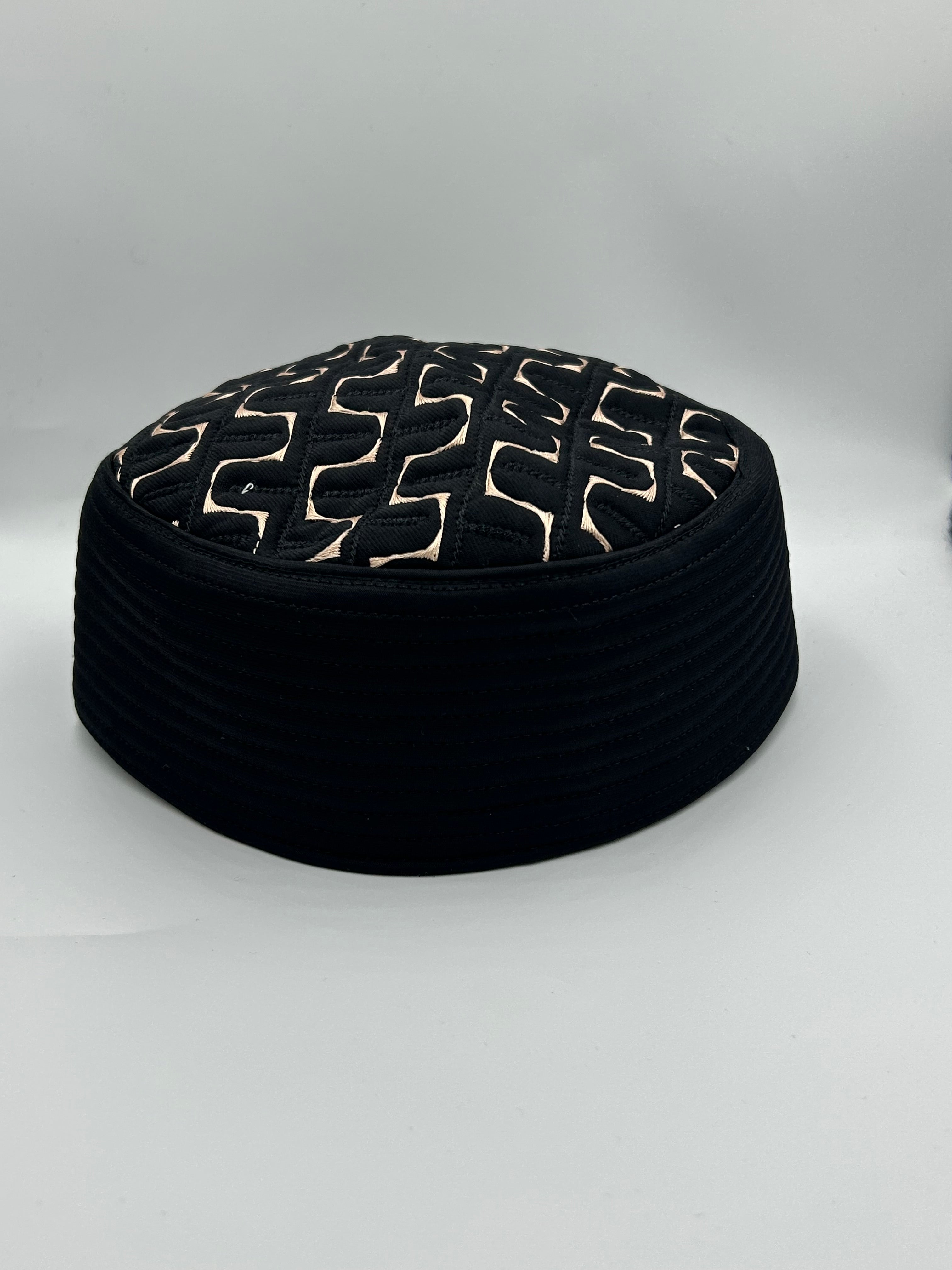 Semi hard black hat with design