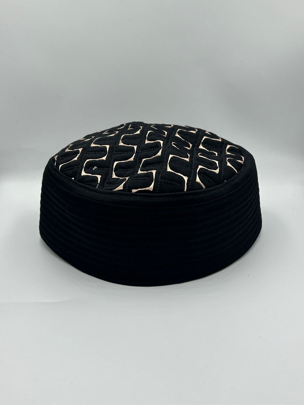 Semi hard black hat with design