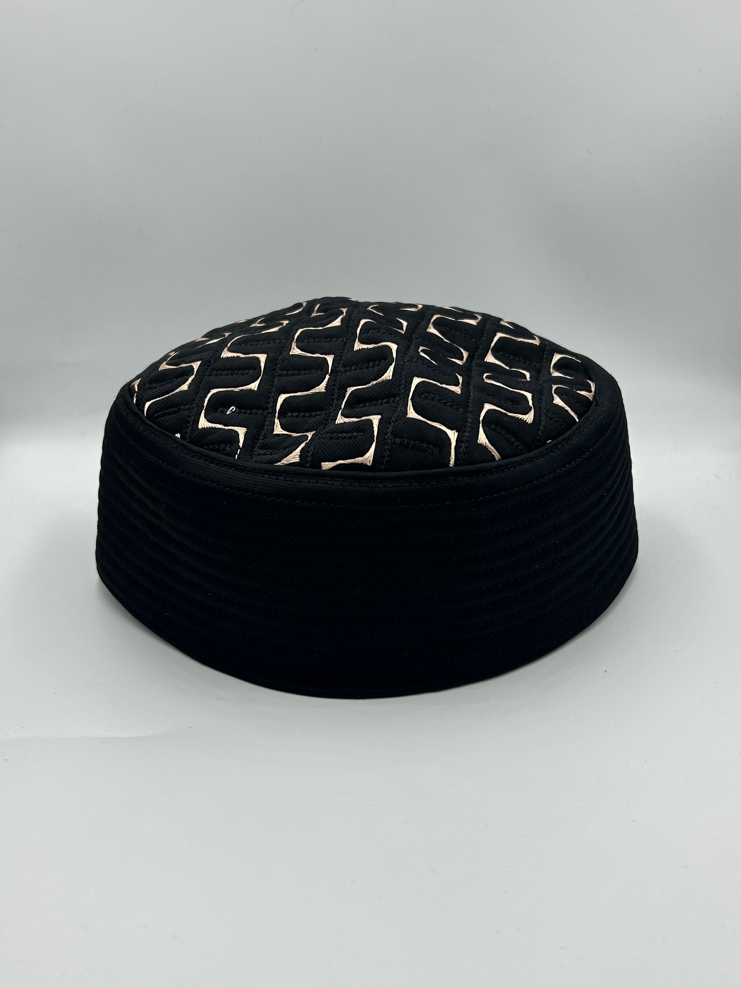 Semi hard black hat with design