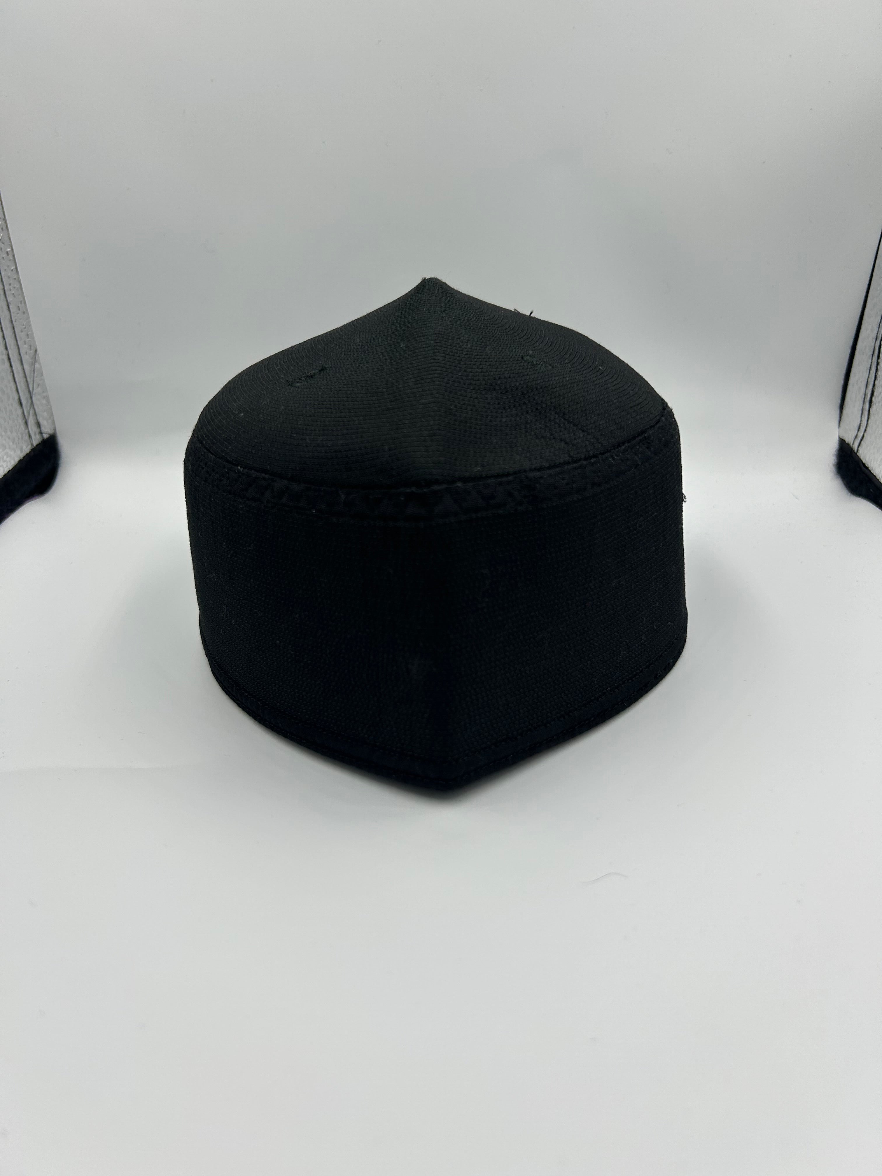 Black Indonesian Hat with holes on the the top