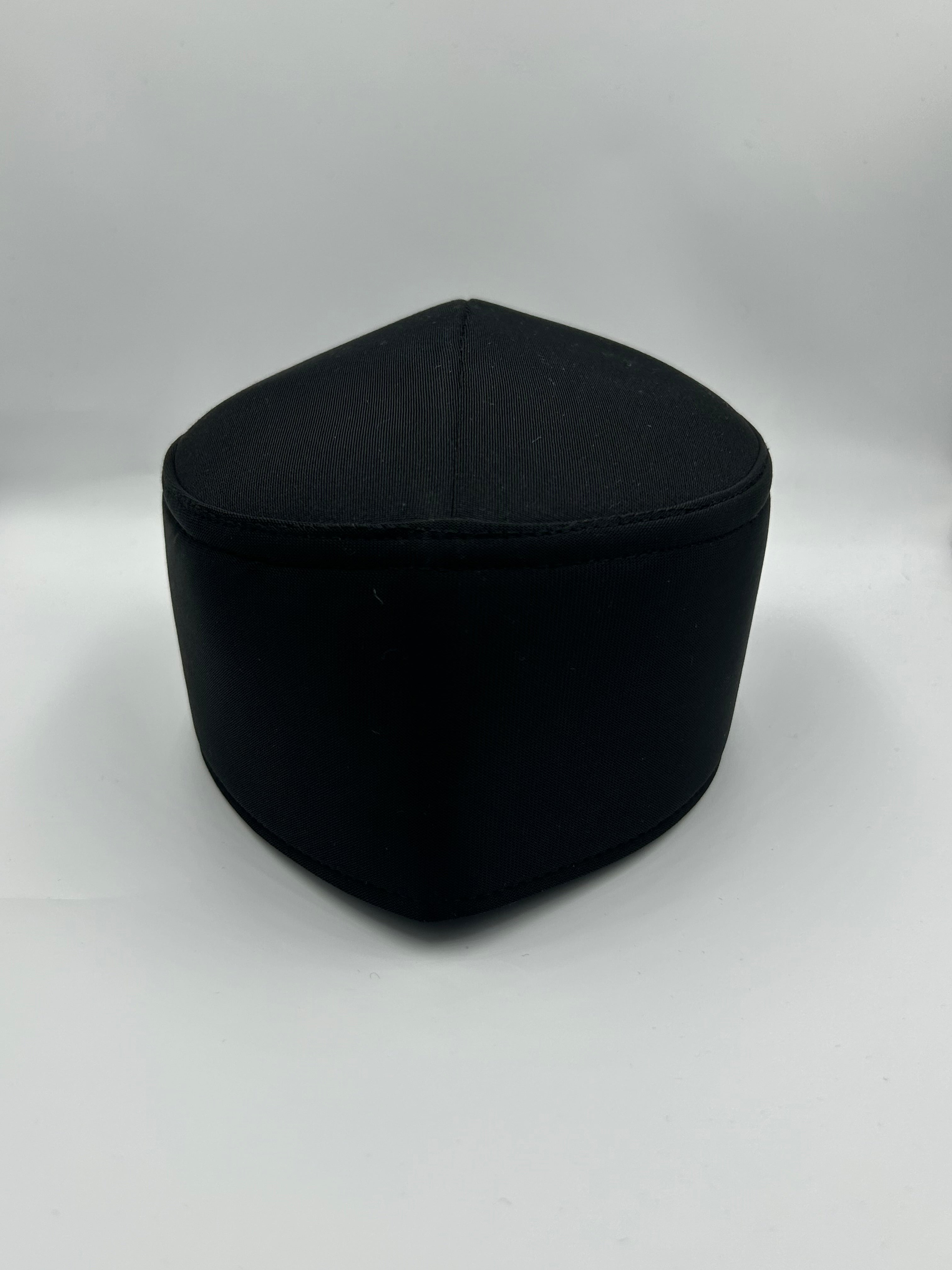 Hard smooth fabric Indonesian Hat with holes on the the top
