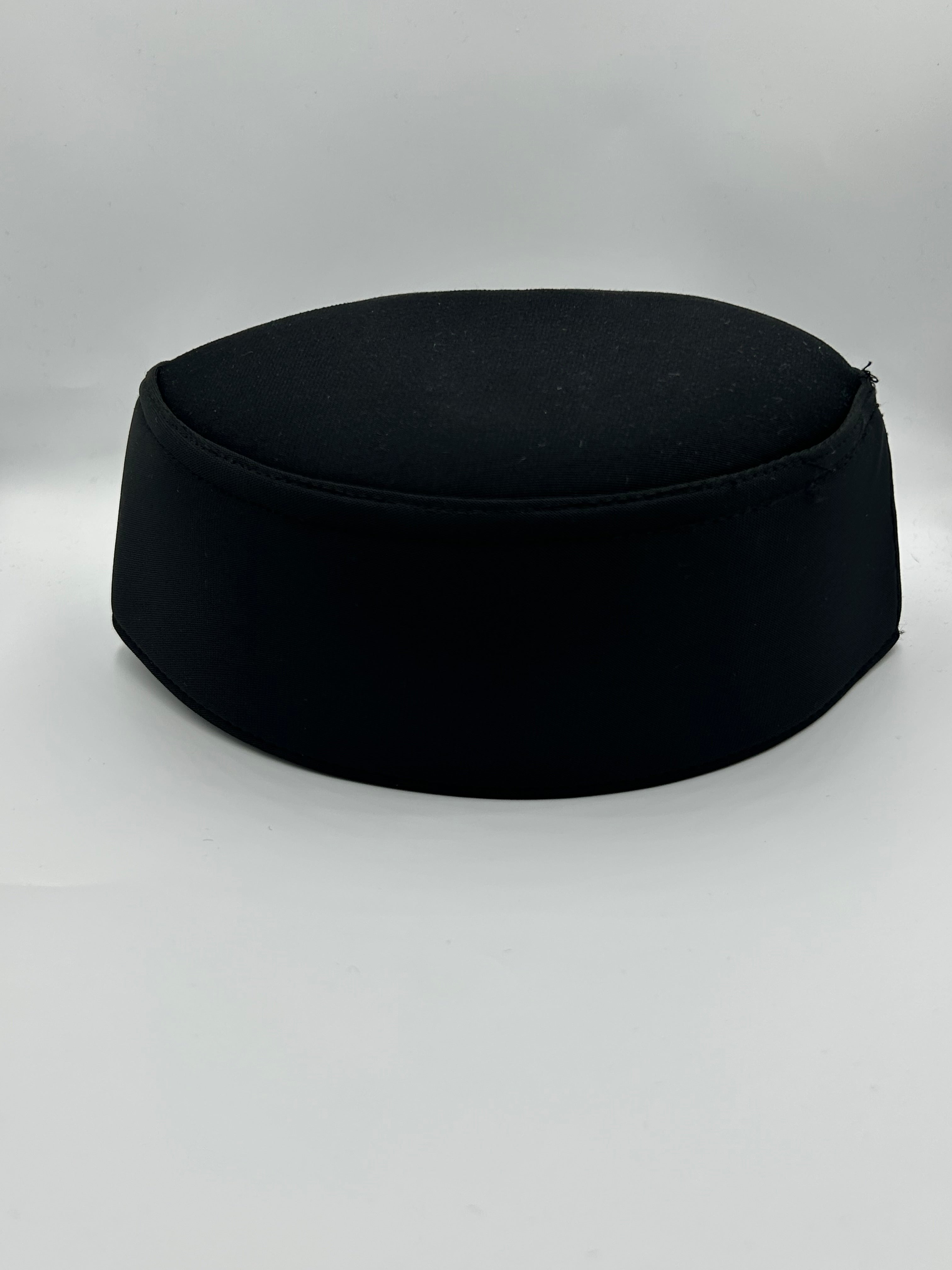 Hard smooth fabric Indonesian Hat with holes on the the top