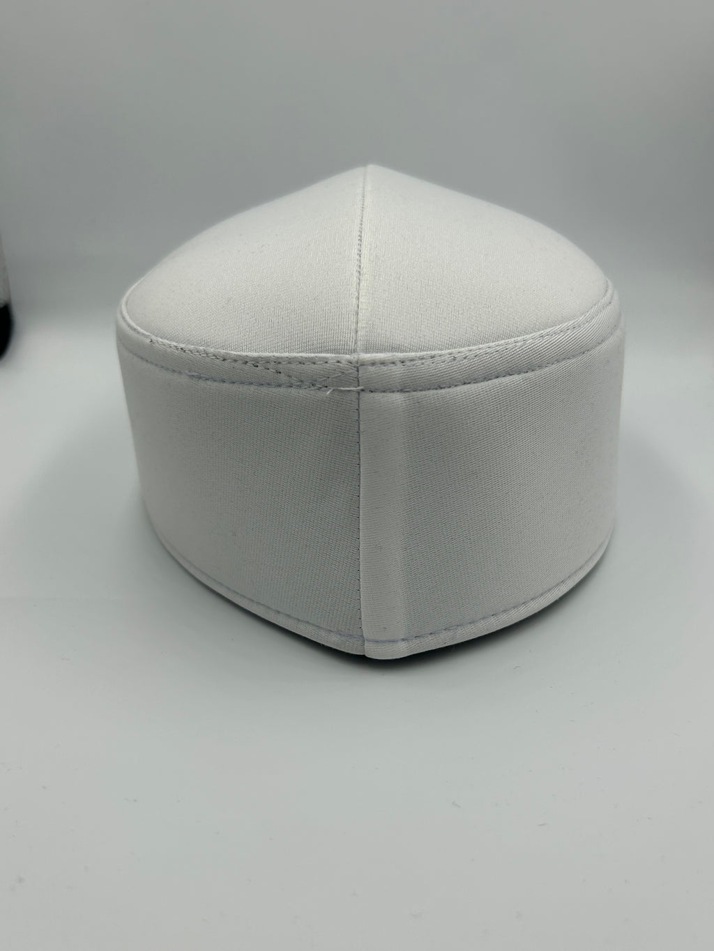 Hard smooth fabric Indonesian Hat with holes on the the top